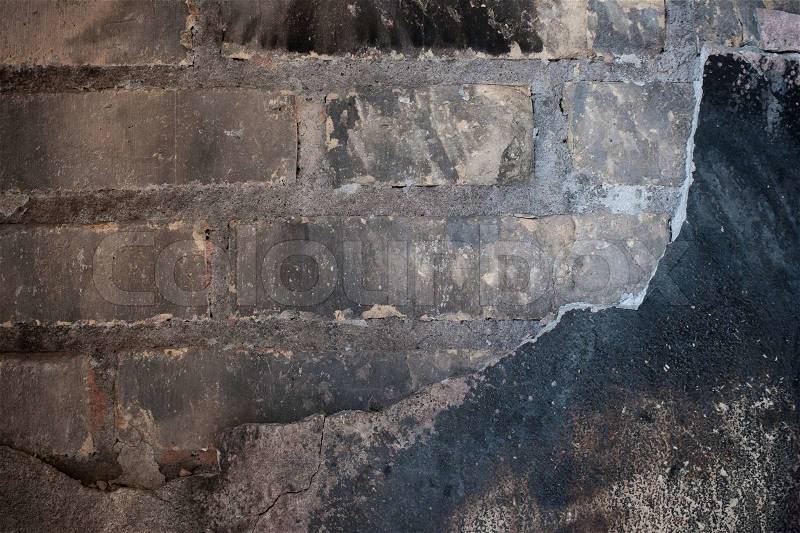 Close up of a wall with soot and fire damages, stock photo