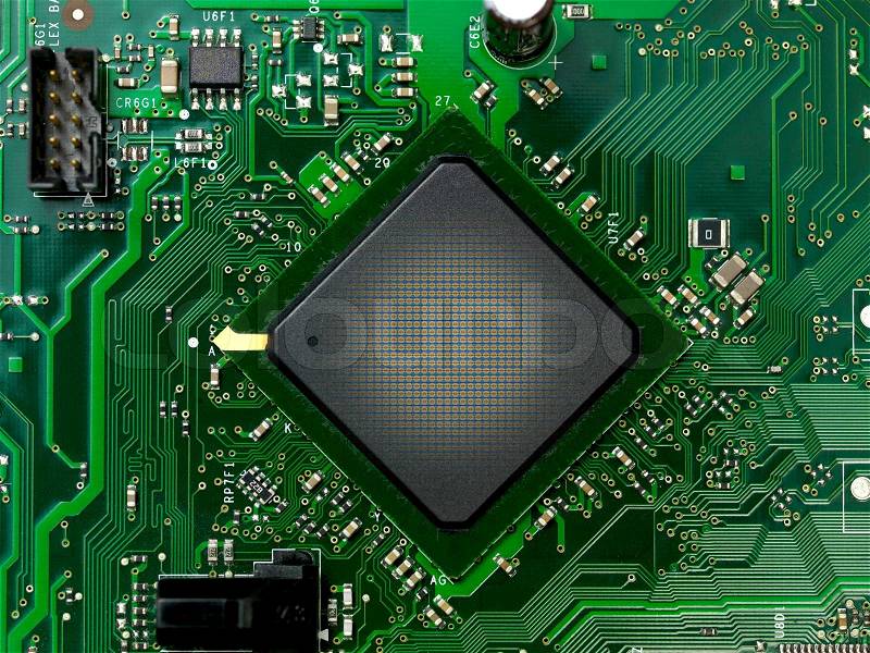 A computer chip on a mother board, stock photo