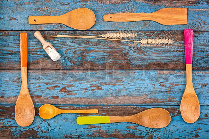 Set kitchen utensils on a wooden background. Accessories for cooking, stock photo