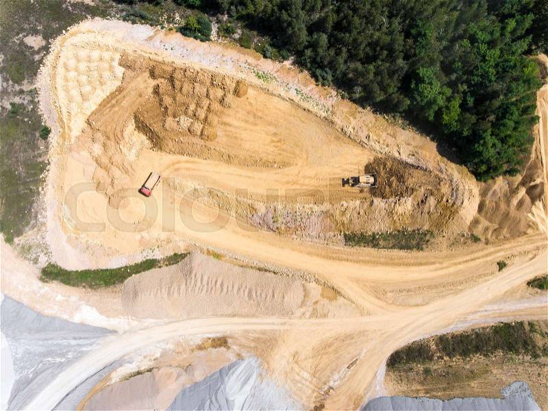 Aerial view over the building materials processing factory. Sand mine. View from above, stock photo