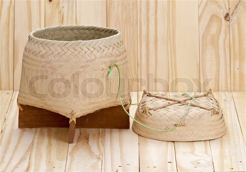 Bamboo basket container for holding cooked glutinous rice (Thailand call Kratib), stock photo