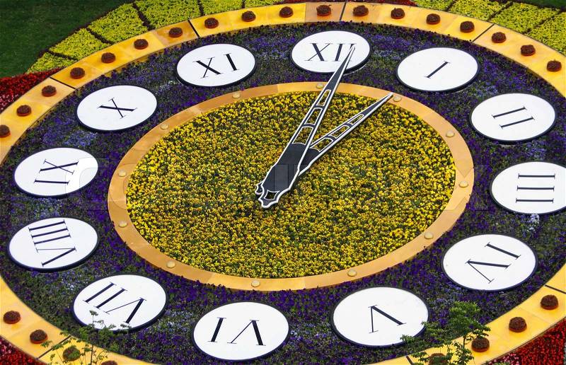 Flower clocks in Kyiv, Ukraine. It is one of the biggest flower clock in the world (19,5m. in diameter), stock photo