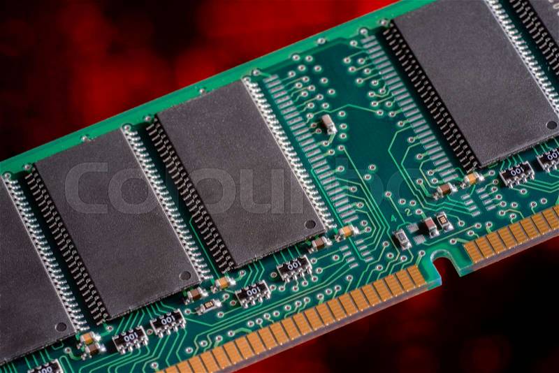 Computer memory closeup in red ambiance, stock photo