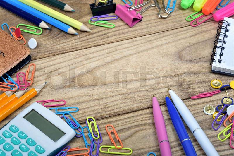 Office tools on wooden table, stock photo