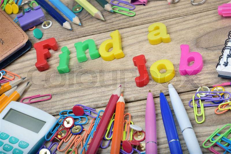 Find a job and office tools on wooden table, stock photo