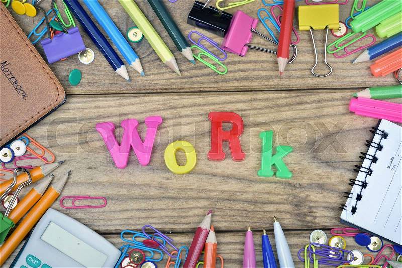 Work word and office tools on wooden table, stock photo