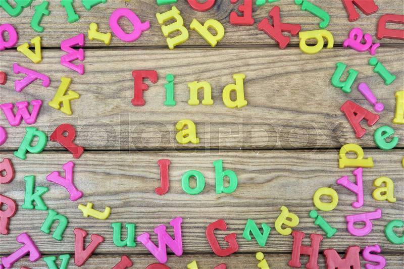 Find a Job word on wooden table, stock photo