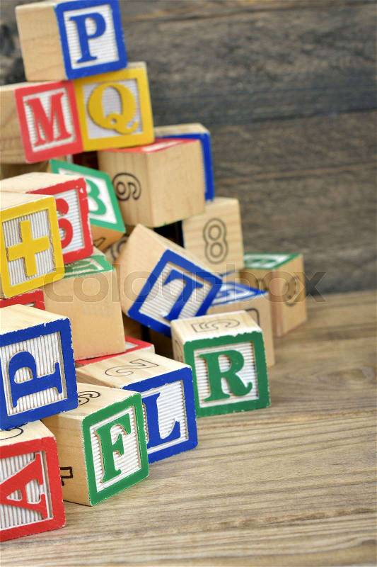 Block letters on wooden table, stock photo