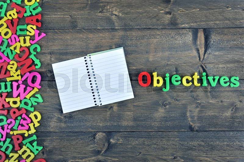 Objectives word on wooden table, stock photo