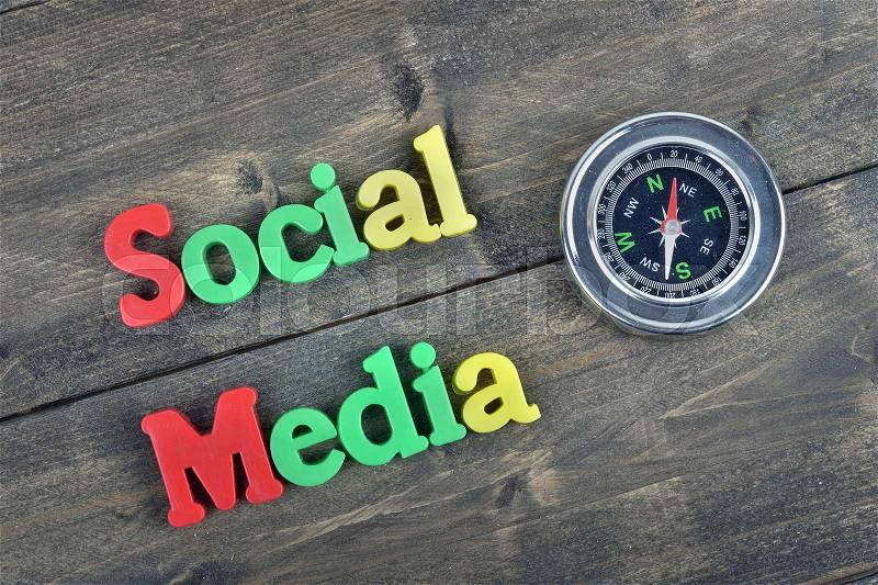 Social Media word on wooden table, stock photo
