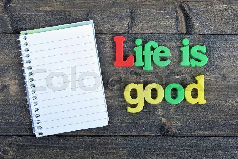 Life is good word on wooden table, stock photo