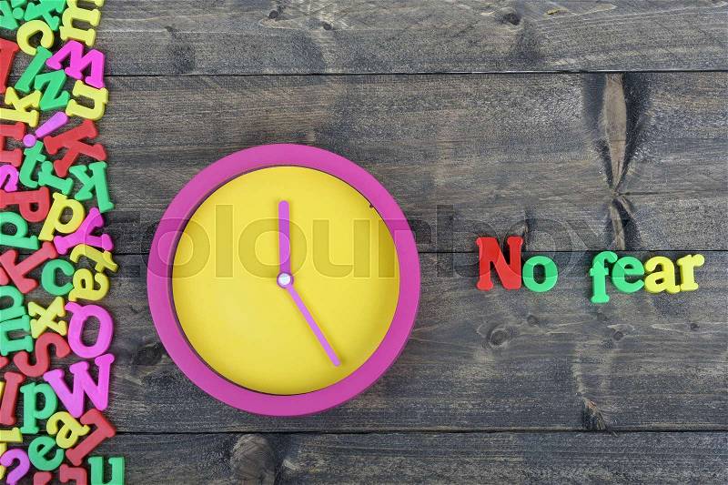 No fear word on wooden table, stock photo