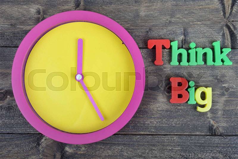 Think big word on wooden table, stock photo