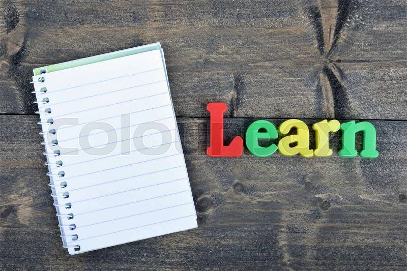 Learn word on wooden table, stock photo