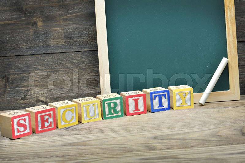 School board and word security on wooden table, stock photo