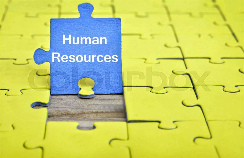 Puzzle pieces with word Human Resources, stock photo