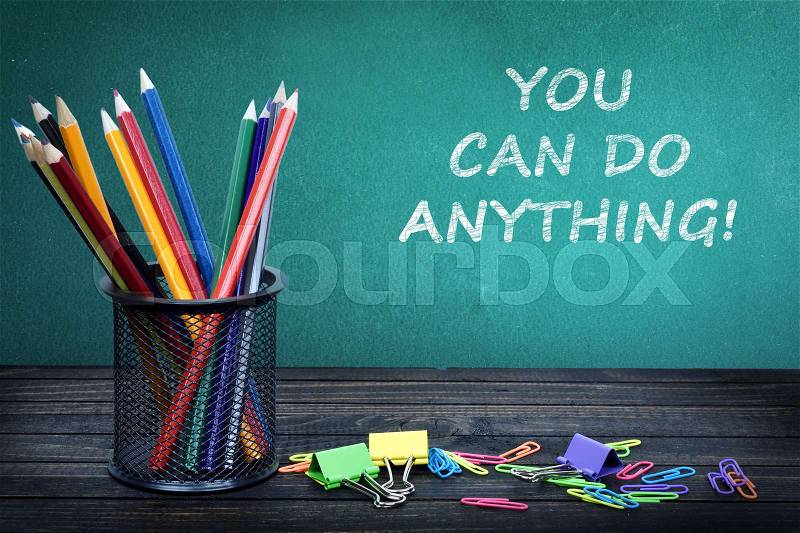 You can do anything text on green board and group of pencils, stock photo