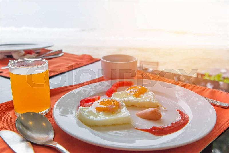 Happy Face Frying Eggs breakfast in the morning, stock photo