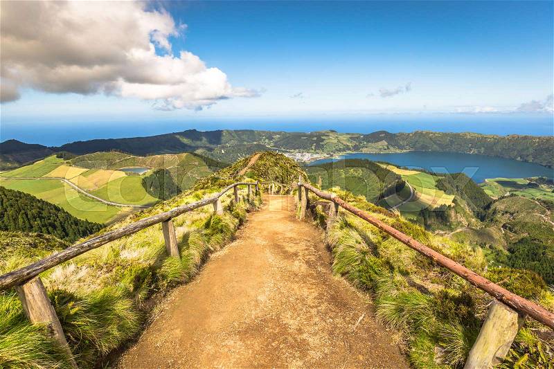 Walking path leading to a view on the lakes of Sete Cidades and Santiago in Sao Miguel, Azores, stock photo