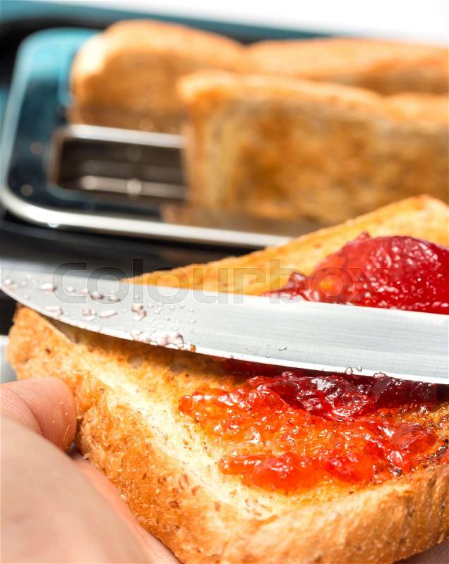 Jam On Toast Indicating Toasted Bread And Berry, stock photo