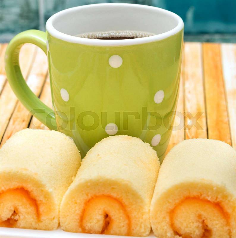 Coffee Orange Cake Represents Swiss Rolls And Bakery, stock photo