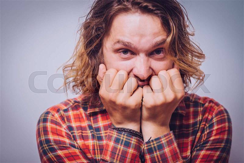 The man is afraid of fear, stock photo