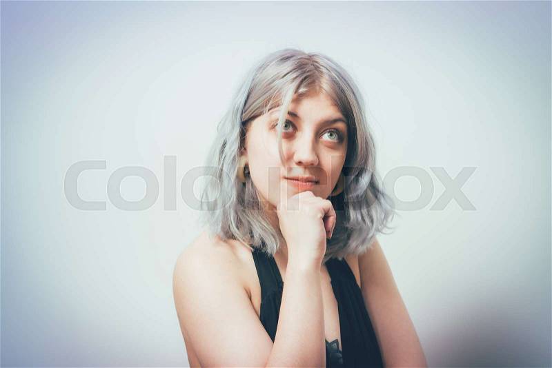 Woman thinks, stock photo