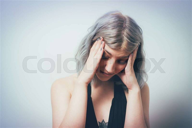 Headache woman, stock photo