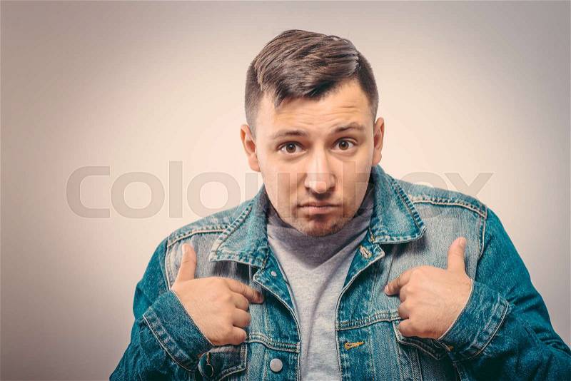 Male hand forefinger pointing to himself on the chest. Gesture. who am i, stock photo