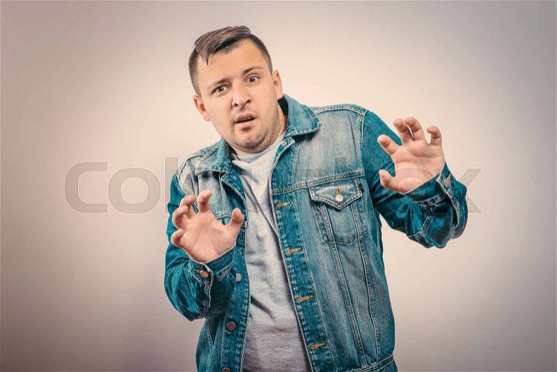 The man is afraid of fear, stock photo