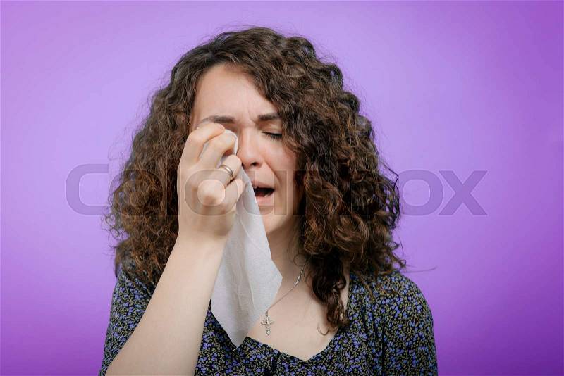 Woman crying, stock photo