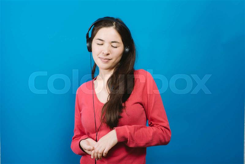 Woman with headphones, stock photo