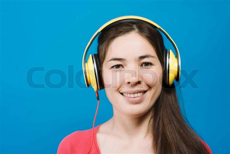 Woman with headphones, stock photo