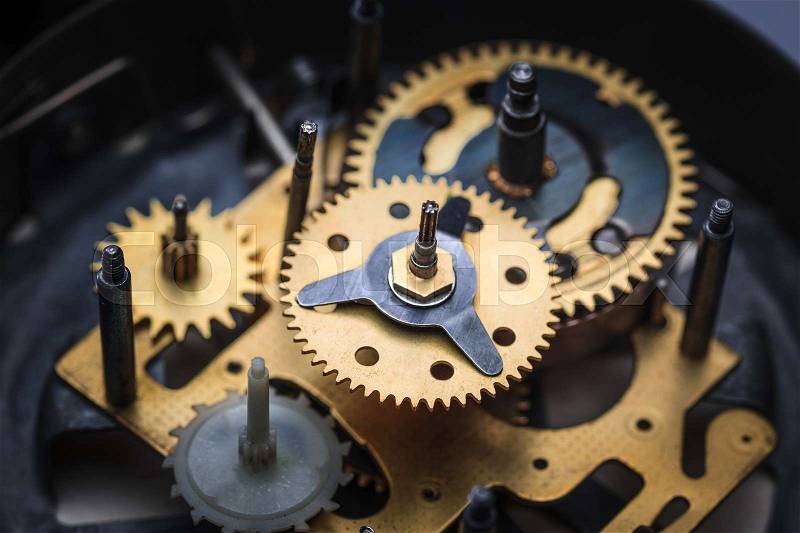 The macro view of old clock mechanism, stock photo