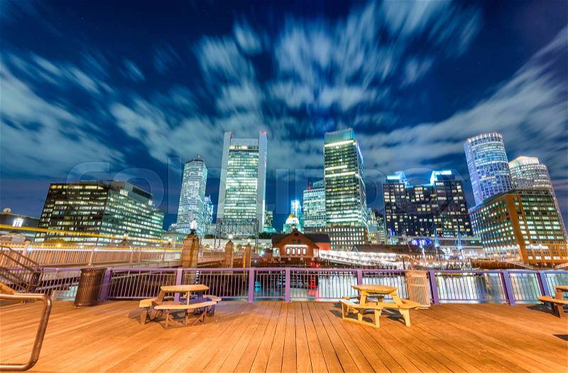 Boston night skyline from city pier, stock photo