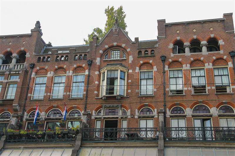 Old style brick building in historic city centre. Amsterdam, the Netherlands, stock photo
