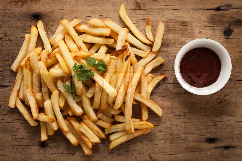 Fries french ketchup herb still life flat lay salt junk fastfood wood background, stock photo