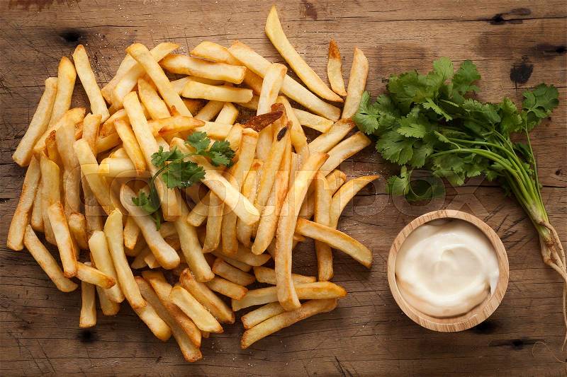 Fries french sour cream herb still life rustic salt junk fastfood wood background, stock photo