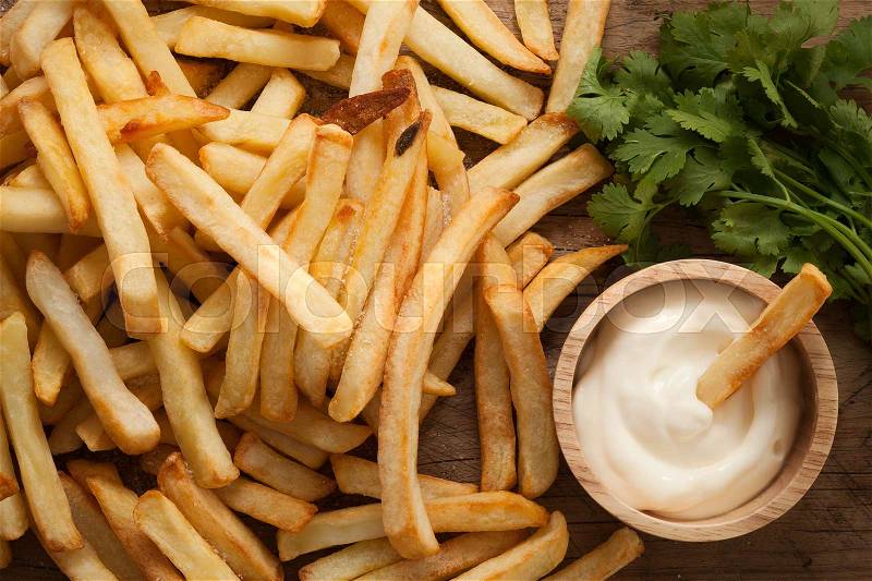 Fries french sour cream herb still life close up rustic salt junk fastfood wood background flat lay, stock photo