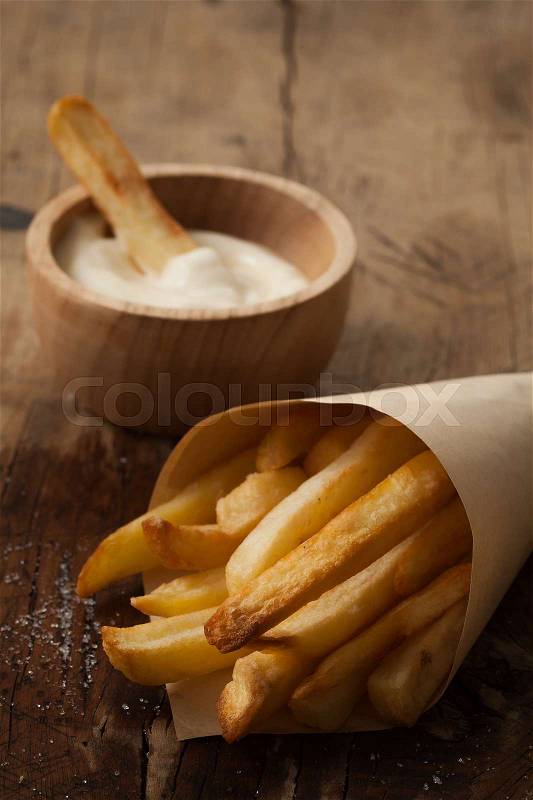 Fries french sour cream still life rustic salt junk fastfood wood background, stock photo