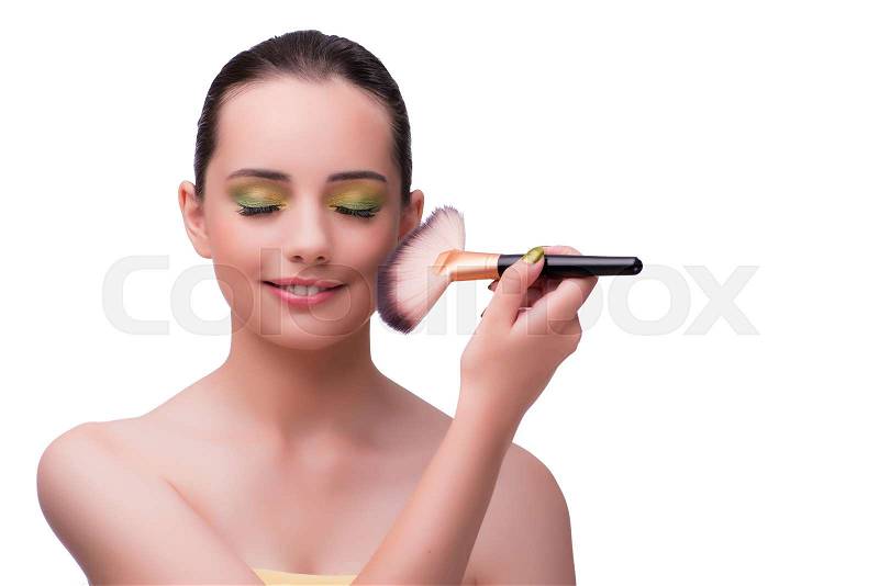 Young woman during make-up session isolated on white, stock photo