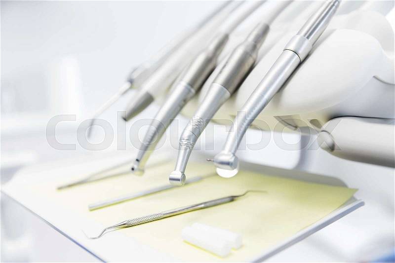 Dentistry, medicine, medical equipment and stomatology concept - close up of dental instruments, stock photo