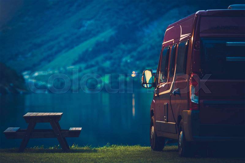 RV Camping at Night. Small Camper Van Overnight Camping, stock photo