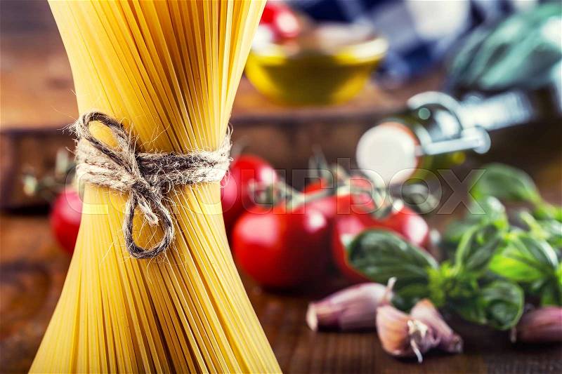 Spaghetti. Some ingredients of Italian cuisine.Italian cuisine, stock photo