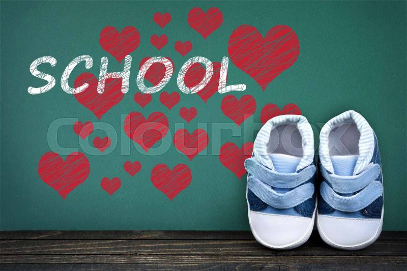 Love School text on school table and kid shoes, stock photo