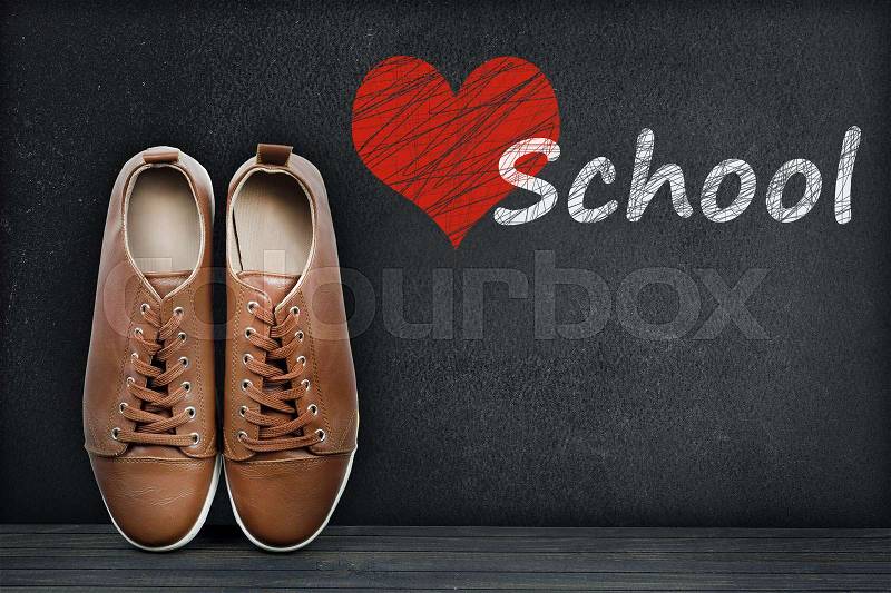 Love School text on black board and shoes, stock photo