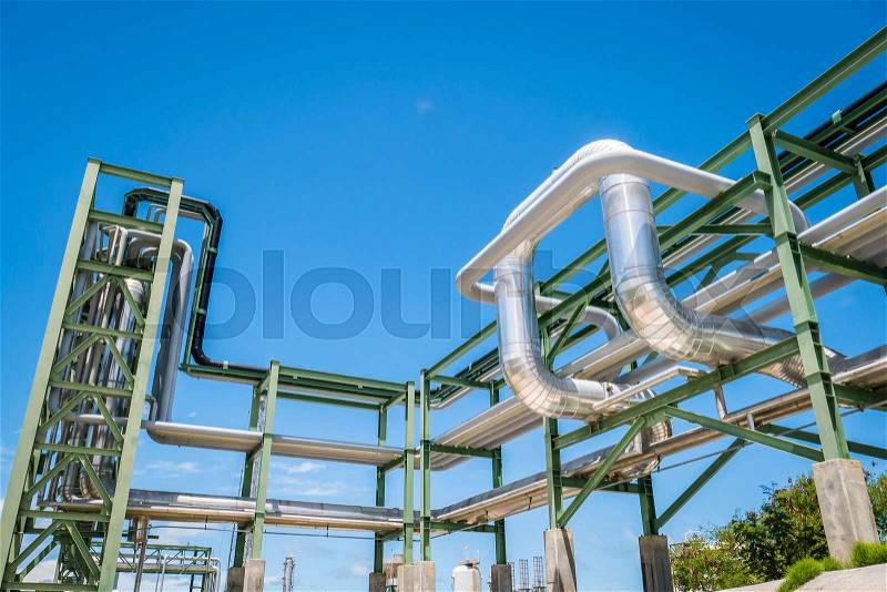 Chemical pipe line transfer on steel structure with blue sky, stock photo