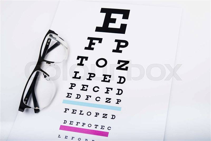 Black eye glasses and focus exam test, stock photo