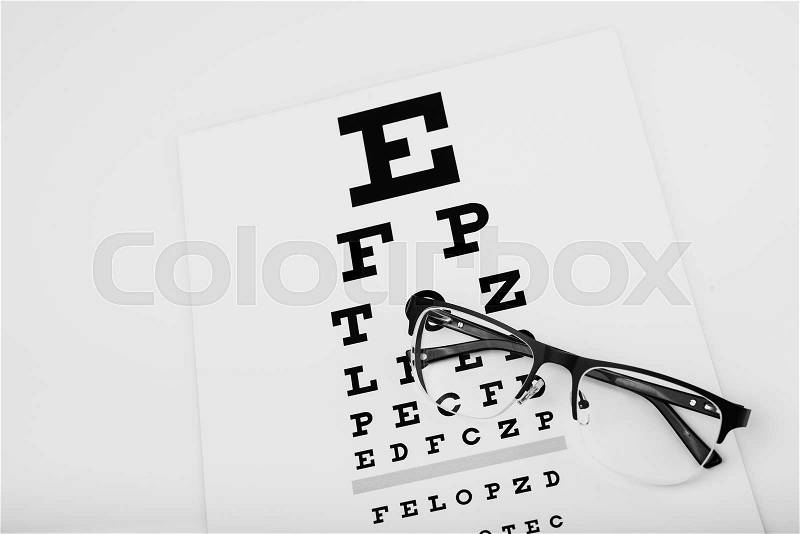 Black eye glasses and focus exam test, stock photo