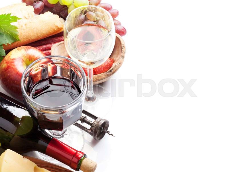 Red and white wine, grape, cheese, bread and sausages. Isolated on white background with copy space, stock photo